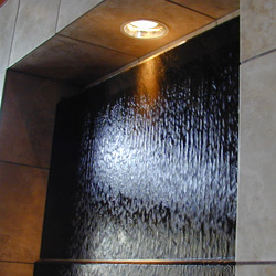 Granite Waterwall Closeup view of the water falling over the Granite Surface
